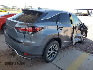 2020 Lexus RX with VIN 2T2AGMDAXLC048248, listed as a Copart auction lot 67398504 with 15,946 mi miles and Salvage Title. Bid and sale history available at carsss.com. Image 3.