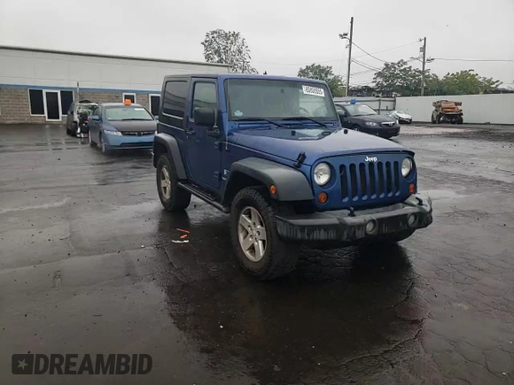 2009 Jeep Wrangler X with VIN 1J4FA24109L712701, listed as a Copart auction lot 60800855 with 156,709 mi miles and Salvage title. Bid and sale history available at DreamBid. Image 13.