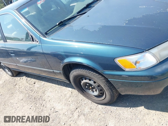 1997 Toyota Camry LE with VIN JT2BG22K5V0073783, listed as a IAAI auction lot 42409561 with 149,560 mi miles and . Bid and sale history available at DreamBid. Image 6.