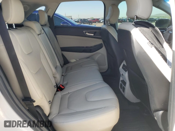 2019 Ford Edge Titanium z VIN 2FMPK3K99KBC62750, wystawiony jako Copart lot #57854045 z przebiegiem 57 327 mil mil oraz Szkoda całkowita • Salvage title. Historia ofert i sprzedaży dostępna na DreamBid. Obrazek 11.