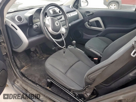 2015 Smart fortwo Passion z VIN WMEEJ3BA8FK789118, wystawiony jako Copart lot #53820815 z przebiegiem 152 487 mil mil oraz Tytuł czysty. Historia ofert i sprzedaży dostępna na DreamBid. Obrazek 8.