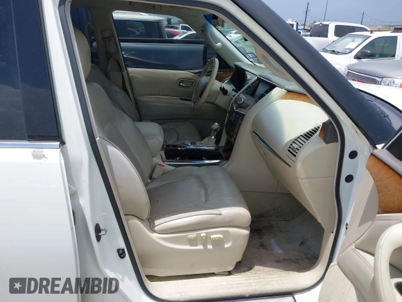 2012 Infiniti QX56 8-passenger with VIN JN8AZ2ND4C9716728, listed as a IAAI auction lot 42501339 with 216,302 mi miles and . Bid and sale history available at DreamBid. Image 5.