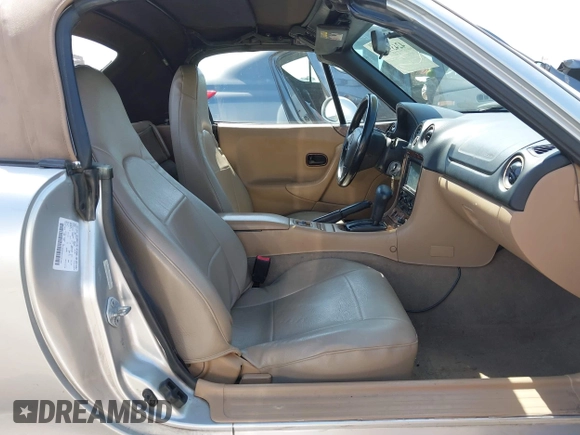 1999 Mazda MX-5 Miata with VIN JM1NB3539X0131393, listed as a IAAI auction lot 42439850 with 210,710 mi miles and . Bid and sale history available at DreamBid. Image 5.