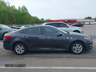 2016 Kia Optima LX with VIN KNAGT4L33G5107444, listed as a IAAI auction lot 41971006 with 174,997 mi miles. Bid and sale history available at carsss.com. Image 13.