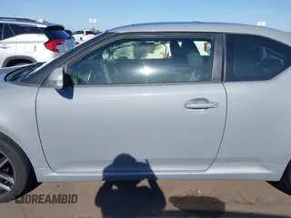 2015 Scion tC with VIN JTKJF5C7XFJ012872, listed as a IAAI auction lot 42128621 with 100,832 mi miles. Bid and sale history available at carsss.com. Image 15.