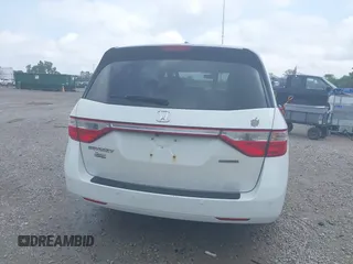 2013 Honda Odyssey Touring with VIN 5FNRL5H9XDB049390, listed as a IAAI auction lot 42532861 with 129,376 mi miles and . Bid and sale history available at DreamBid. Image 17.