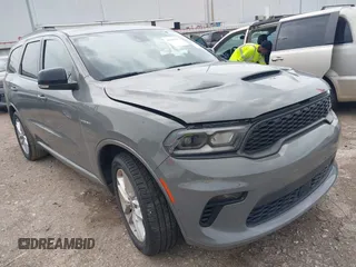 2023 Dodge Durango R/T Plus z VIN 1C4SDHCT9PC553174, wystawiony jako IAAI lot #42635197 z przebiegiem 51 121 mil mil oraz . Historia ofert i sprzedaży dostępna na DreamBid. Obrazek 1.