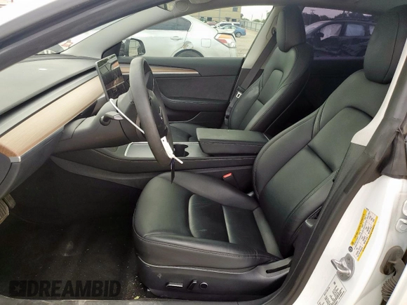 2023 Tesla Model 3 with VIN 5YJ3E1EA3PF562251, listed as a Copart auction lot 58293355 with 16,283 mi miles and Salvage title. Bid and sale history available at DreamBid. Image 7.