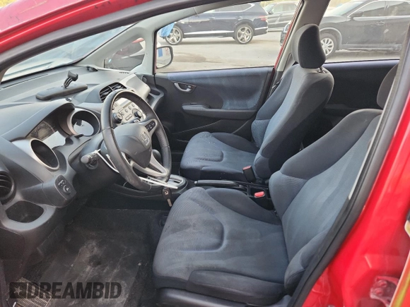 2009 Honda Fit Sport z VIN JHMGE88479S055924, wystawiony jako Copart lot #67186495 z przebiegiem 65 984 mil mil oraz Szkoda całkowita • Salvage title. Historia ofert i sprzedaży dostępna na DreamBid. Obrazek 7.