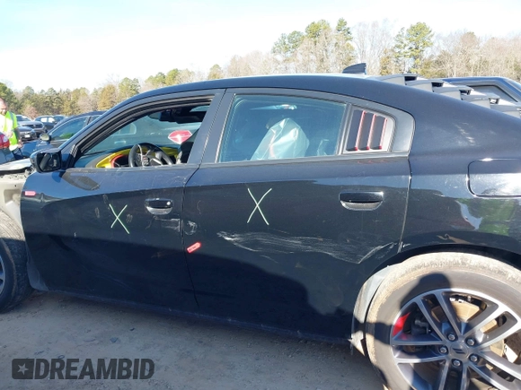 2019 Dodge Charger SXT with VIN 2C3CDXJG4KH710673, listed as a IAAI auction lot 41469797 with 102,011 mi miles and . Bid and sale history available at DreamBid. Image 15.