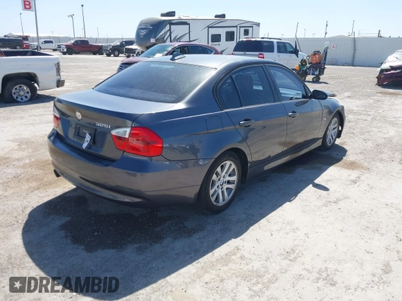 2006 BMW 3 Series 325i with VIN WBAVB13506KX51462, listed as a IAAI auction lot 41811523 with Not Provided miles. Bid and sale history available at carsss.com. Image 4.