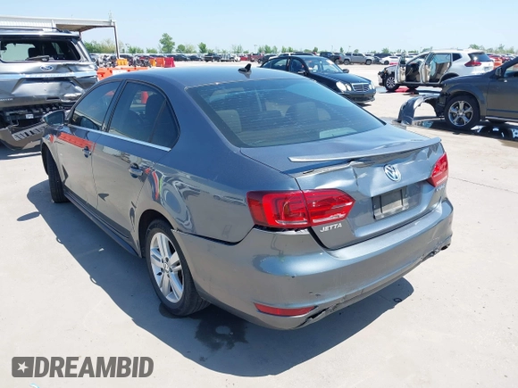 2013 Volkswagen Jetta Sedan Hybrid SE with VIN 3VW637AJ9DM228757, listed as a IAAI auction lot 41990054 with 176,365 mi miles. Bid and sale history available at carsss.com. Image 3.