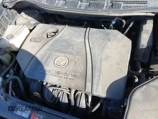 2007 Mazda 5 Touring with VIN JM1CR293970135693, listed as a IAAI auction lot 41976260 with 211,978 mi miles and . Bid and sale history available at carsss.com. Image 10.