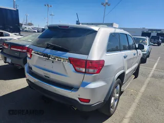 2012 Jeep Grand Cherokee Limited with VIN 1C4RJEBT0CC204468, listed as a IAAI auction lot 41928858 with 167,643 mi miles. Bid and sale history available at carsss.com. Image 4.