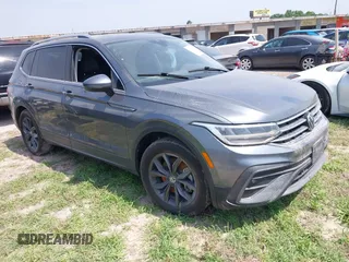 2023 Volkswagen Tiguan SE z VIN 3VVNB7AX2PM064599, wystawiony jako IAAI lot #41923005 z przebiegiem Nie podano mil oraz . Historia ofert i sprzedaży dostępna na DreamBid. Obrazek 1.