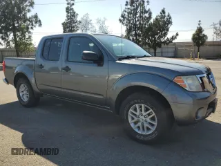 2016 Nissan Frontier SV with VIN 1N6AD0ER3GN729992, listed as a Copart auction lot 61014915 with 102,422 mi miles and Salvage title. Bid and sale history available at DreamBid. Image 4.