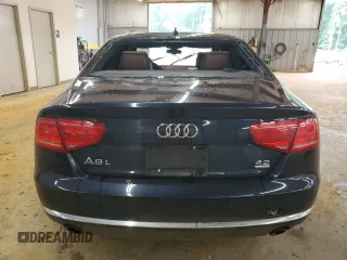 2011 Audi A8 z VIN WAURVAFD4BN005925, wystawiony jako Copart lot #56998325 z przebiegiem 147 449 mil mil oraz Tytuł czysty. Historia ofert i sprzedaży dostępna na DreamBid. Obrazek 6.