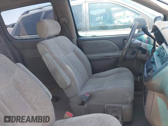 1999 Toyota Sienna LE with VIN 4T3ZF13C3XU109706, listed as a IAAI auction lot 42034205 with 1 mi miles. Bid and sale history available at carsss.com. Image 5.
