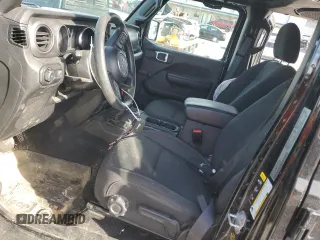 2023 Jeep Wrangler Sport with VIN 1C4HJXDN7PW530536, listed as a Copart auction lot 69664634 with 16,816 mi miles and Salvage Title. Bid and sale history available at DreamBid. Image 7.