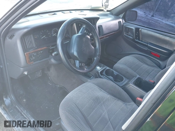 1996 Jeep Grand Cherokee Laredo with VIN 1J4GZ58S3TC197587, listed as a IAAI auction lot 41423318 with 200,116 mi miles. Bid and sale history available at carsss.com. Image 5.