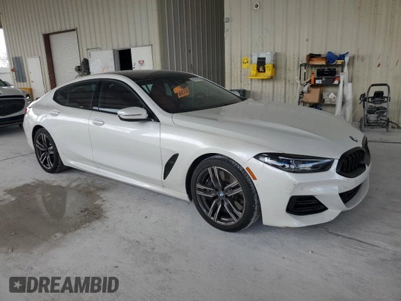 2023 BMW 8 Series 840i with VIN WBAGV4C00PCL13414, listed as a Copart auction lot 51512755 with 23,133 mi miles and Salvage title. Bid and sale history available at DreamBid. Image 4.