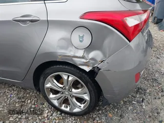 2013 Hyundai Elantra GT with VIN KMHD35LEXDU114448, listed as a IAAI auction lot 41944985 with 71,180 mi miles. Bid and sale history available at carsss.com. Image 6.