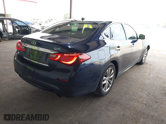 2015 Infiniti Q70 z VIN JN1BY1AP9FM542429, wystawiony jako IAAI lot #41903214 z przebiegiem 139 255 mil mil oraz . Historia ofert i sprzedaży dostępna na DreamBid. Obrazek 4.