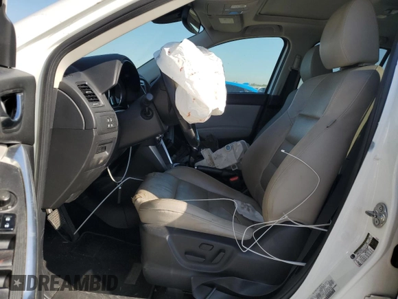 2015 Mazda CX-5 Grand Touring with VIN JM3KE2DY1F0453386, listed as a Copart auction lot 50580185 with 174,309 mi miles and Salvage Title. Bid and sale history available at carsss.com. Image 7.