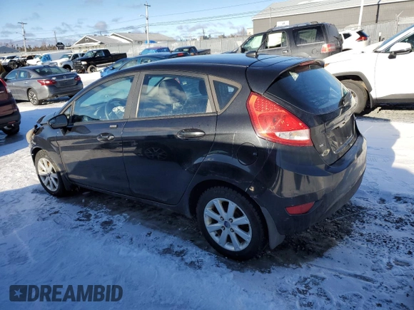 2013 Ford Fiesta SE with VIN 3FADP4EJXDM102520, listed as a Copart auction lot 44522025 with 135,997 mi miles and Clean Title. Bid and sale history available at carsss.com. Image 2.