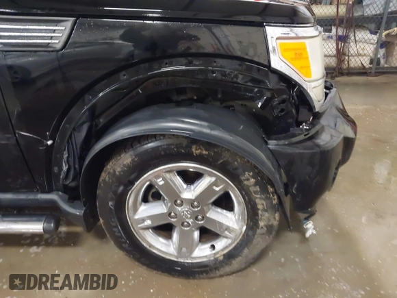 2007 Dodge Nitro SLT with VIN 1D8GT58K77W724530, listed as a IAAI auction lot 41499022 with 214,183 mi miles. Bid and sale history available at carsss.com. Image 6.