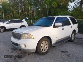 2004 Lincoln Navigator Luxury with VIN 5LMFU27RX4LJ34879, listed as a IAAI auction lot 42024945 with 154,667 mi miles. Bid and sale history available at carsss.com. Image 2.