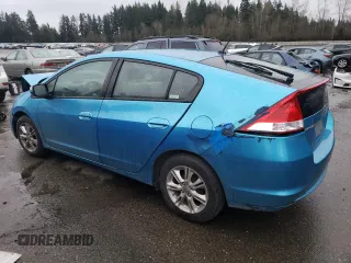 2010 Honda Insight EX z VIN JHMZE2H79AS017003, wystawiony jako Copart lot #87313754 z przebiegiem 159 936 mil mil oraz Czysty tytuł • Clean title. Historia ofert i sprzedaży dostępna na DreamBid. Obrazek 2.