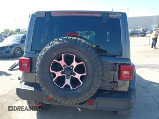 2020 Jeep Wrangler Unlimited Rubicon z VIN 1C4HJXFN0LW300344, wystawiony jako IAAI lot #41943662 z przebiegiem 59 051 mil mil oraz . Historia ofert i sprzedaży dostępna na DreamBid. Obrazek 16.