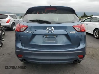 2016 Mazda CX-5 Sport with VIN JM3KE2BY4G0789618, listed as a Copart auction lot 53318245 with 52,801 mi miles and Salvage Title. Bid and sale history available at carsss.com. Image 6.