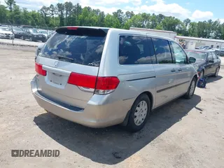 2008 Honda Odyssey LX with VIN 5FNRL38228B090366, listed as a IAAI auction lot 42336820 with 319,401 mi miles and . Bid and sale history available at DreamBid. Image 4.
