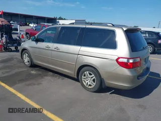 2005 Honda Odyssey EX-L z VIN 5FNRL38735B111376, wystawiony jako IAAI lot #42378824 z przebiegiem 191 632 mil mil oraz . Historia ofert i sprzedaży dostępna na DreamBid. Obrazek 3.