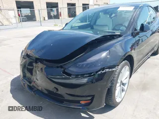 2019 Tesla Model 3 Long Range with VIN 5YJ3E1EB6KF192477, listed as a IAAI auction lot 41981600 with 62,888 mi miles. Bid and sale history available at carsss.com. Image 19.