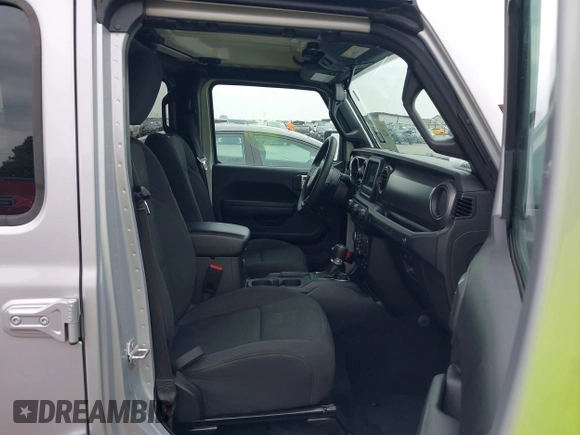 2023 Jeep Wrangler Sport with VIN 1C4HJXDG2PW508235, listed as a IAAI auction lot 42127823 with 25,069 mi miles and . Bid and sale history available at DreamBid. Image 5.