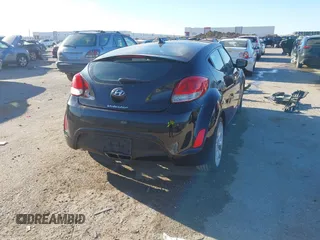 2012 Hyundai Veloster w/Gray Int with VIN KMHTC6AD6CU046899, listed as a IAAI auction lot 41804550 with 105,686 mi miles. Bid and sale history available at carsss.com. Image 4.