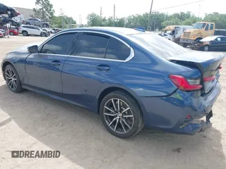 2021 BMW 3 Series 330i with VIN 3MW5R1J05M8B71660, listed as a IAAI auction lot 41923054 with 37,636 mi miles. Bid and sale history available at carsss.com. Image 3.