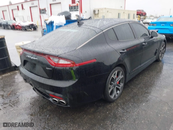 2018 Kia Stinger GT1 with VIN KNAE45LC4J6035780, listed as a IAAI auction lot 41560394 with 86,312 mi miles. Bid and sale history available at carsss.com. Image 4.