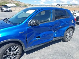 2016 Mitsubishi Outlander Sport 2.0 ES with VIN JA4AP3AU0GZ064591, listed as a IAAI auction lot 41955956 with 110,443 mi miles. Bid and sale history available at carsss.com. Image 6.
