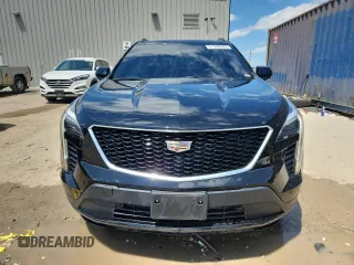 2020 Cadillac XT4 AWD Sport с VIN 1GYFZFR48LF017813, выставлен на аукционе Copart как лот 61940945 с пробегом 34 846 миль миль и Списание • Salvage title. История ставок и продаж доступна на DreamBid. Изображение 5.