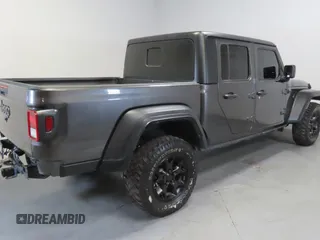 2023 Jeep Gladiator Freedom with VIN 1C6JJTAG9PL557861, listed as a Copart auction lot 56429485 with 44,716 mi miles and Salvage title. Bid and sale history available at DreamBid. Image 3.