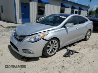2013 Hyundai Azera z VIN KMHFH4JG4DA224650, wystawiony jako Copart lot #63980675 z przebiegiem 151 511 mil mil oraz Szkoda całkowita • Salvage title. Historia ofert i sprzedaży dostępna na DreamBid. Obrazek 1.