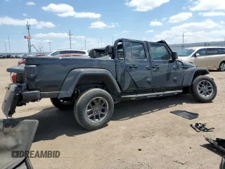 2021 Jeep Gladiator 80th Anniversary с VIN 1C6HJTAG2ML513632, выставлен на аукционе Copart как лот 57140595 с пробегом Не указан миль и Списание • Salvage title. История ставок и продаж доступна на DreamBid. Изображение 3.