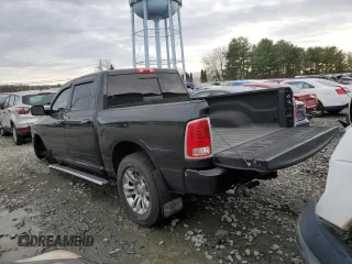 2015 Ram 1500 Laramie Longhorn with VIN 1C6RR7PM8FS633140, listed as a Copart auction lot 82487774 with 100,155 mi miles and Salvage title. Bid and sale history available at DreamBid. Image 2.