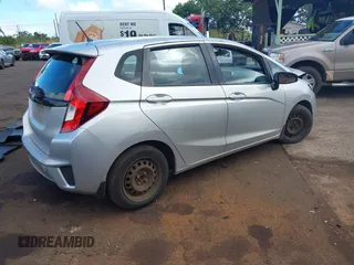 2015 Honda Fit LX with VIN 3HGGK5H58FM727710, listed as a IAAI auction lot 42208290 with 121,552 mi miles. Bid and sale history available at carsss.com. Image 4.