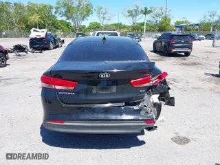 2017 Kia Optima EX with VIN 5XXGU4L35HG142807, listed as a IAAI auction lot 41856251 with 104,634 mi miles. Bid and sale history available at carsss.com. Image 16.