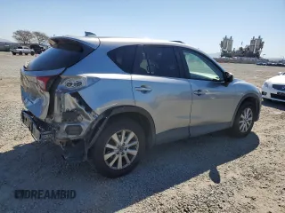2015 Mazda CX-5 Touring with VIN JM3KE2CY5F0483492, listed as a Copart auction lot 48426065 with 158,749 mi miles and Salvage Title. Bid and sale history available at carsss.com. Image 3.